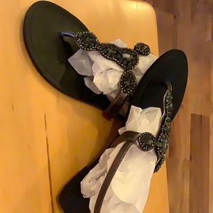 BCBG Generation jeweled thong with heel strap.